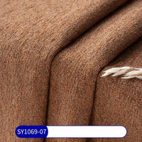 Tissu chenille à pois multicolores au mètre