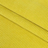 Gros plan sur trois pièces empilées de "Velours côtelé coton 8 côtes uni au mètre" de Longan Craft France, montrant des crêtes en relief - idéal pour confectionner des vêtements, des accessoires ou de la décoration avec ce velours côtelé de coton de haute qualité.