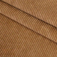 Gros plan sur plusieurs pièces pliées de Velours côtelé coton 8 côtes uni de Longan Craft France, mettant en évidence la qualité de la texture nervurée verticale, idéale pour les vêtements, les accessoires et la décoration.