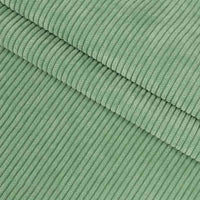 Gros plan sur le pliage de Velours côtelé coton 8 côtes uni au mètre de Longan Craft France, mettant en valeur sa texture douce et ses stries verticales - idéal pour la confection de vêtements, d'accessoires ou de décorations de qualité.