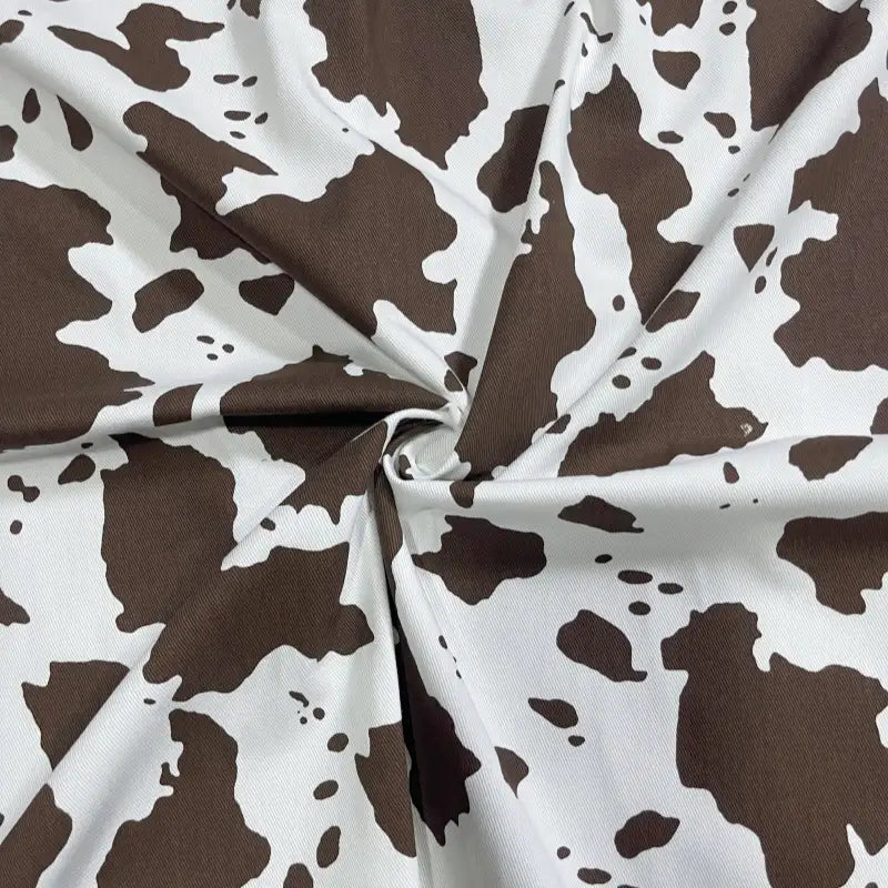 Tissu pour jean imprimé vache au mètre