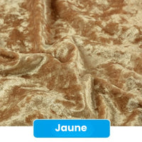 Un gros plan du tissu en velours froissé au mètre de Longan Craft France montre un tissu brun jaunâtre doux et froissé avec une surface texturée. En bas, une étiquette bleue indique "Jaune". Le tissu mesure 63 pouces de large et est idéal pour le bricolage et la tapisserie d'ameublement.