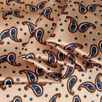 Découvrez le tissu polyester satiné de Longan Craft France au mètre, qui présente un cachemire coloré et un imprimé floral, idéal pour les vêtements élégants.