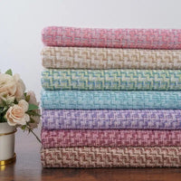 Tissu en tweed chenille tendance au mètre