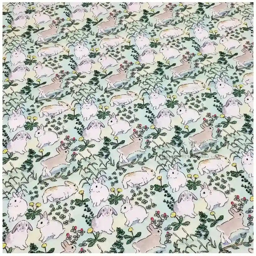 Le tissu de Pâques motif défilé de lapins fleuris 100 % coton Longan Craft France est idéal au mètre pour vos projets DIY printaniers, déco ou vêtements enfants.
