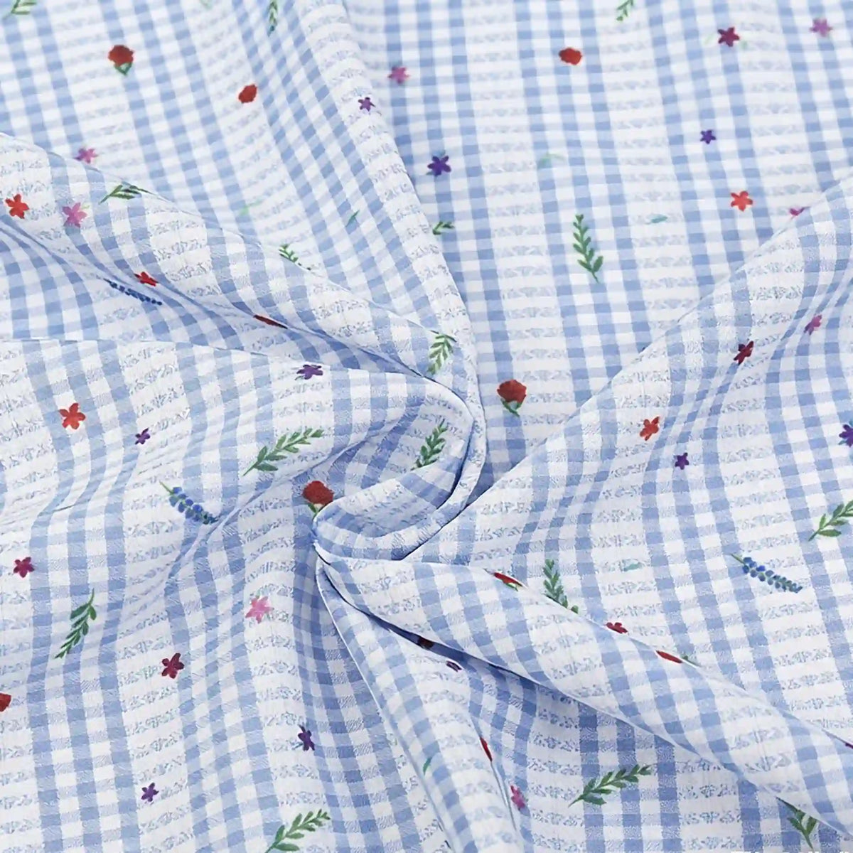 Le Tissu pour patchwork vichy au mètre de Longan Craft France est un tissu polyester confortable à motif botanique bleu et blanc, idéal pour les vêtements décontractés ou projets couture.