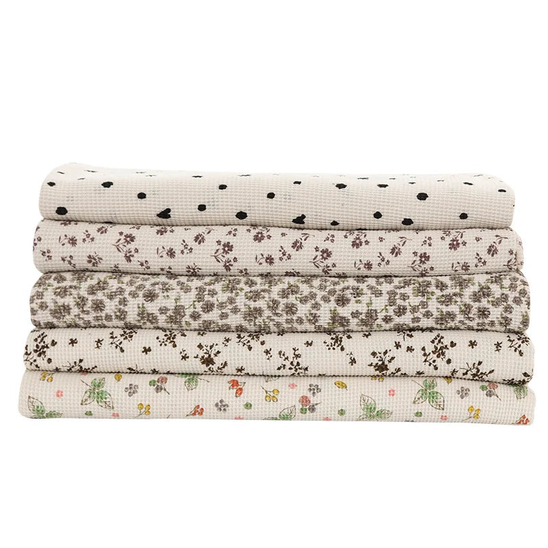 Tissu gaufré à fleurs au mètre