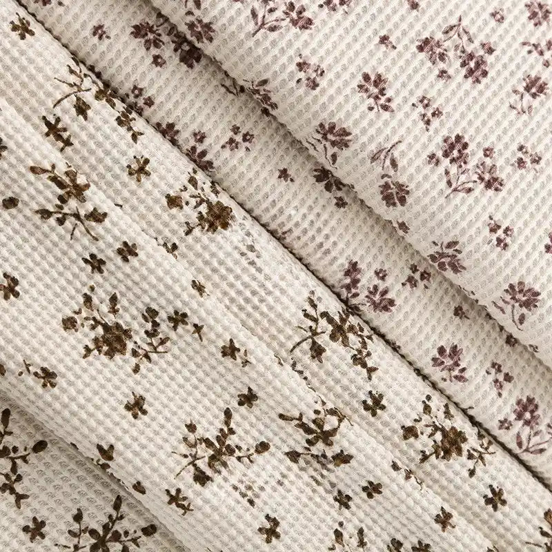Tissu gaufré à fleurs au mètre