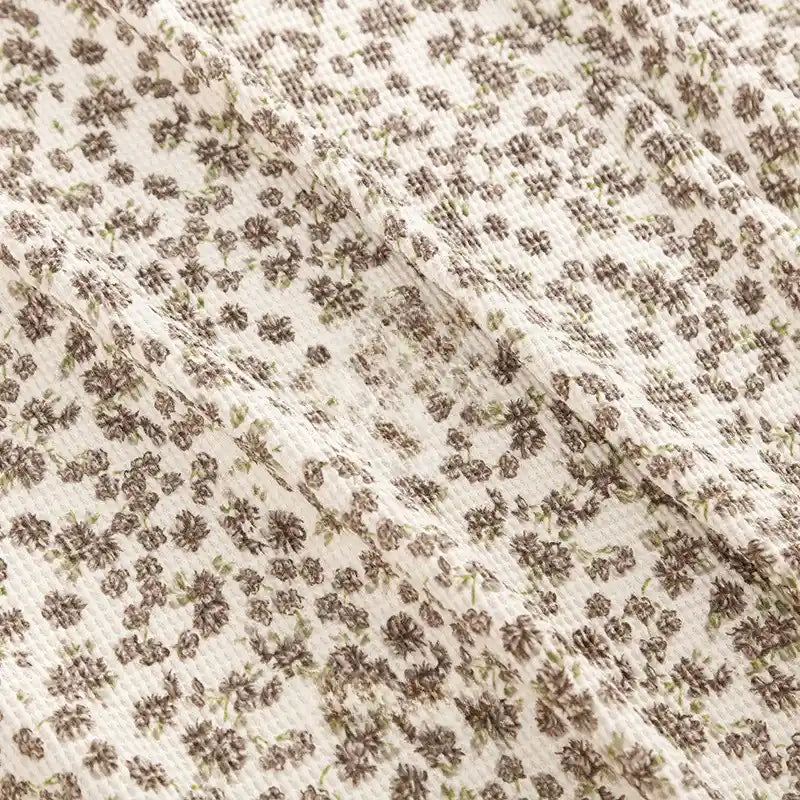 Tissu gaufré à fleurs au mètre