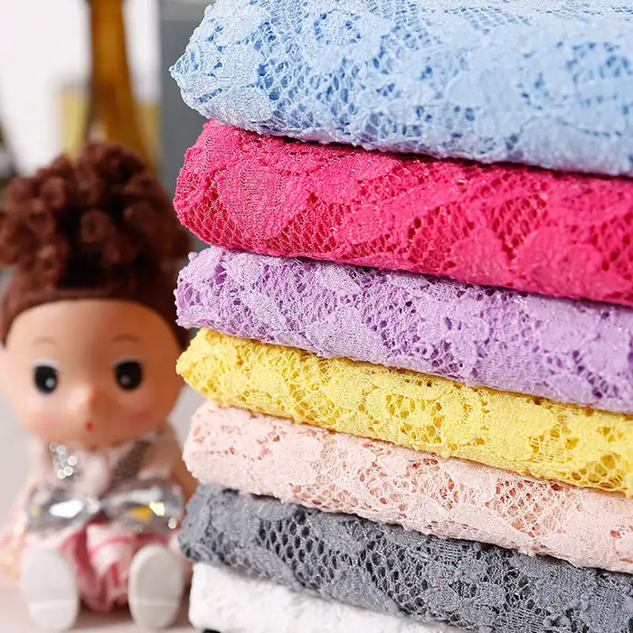 Tissu en dentelle fleurie au mètre