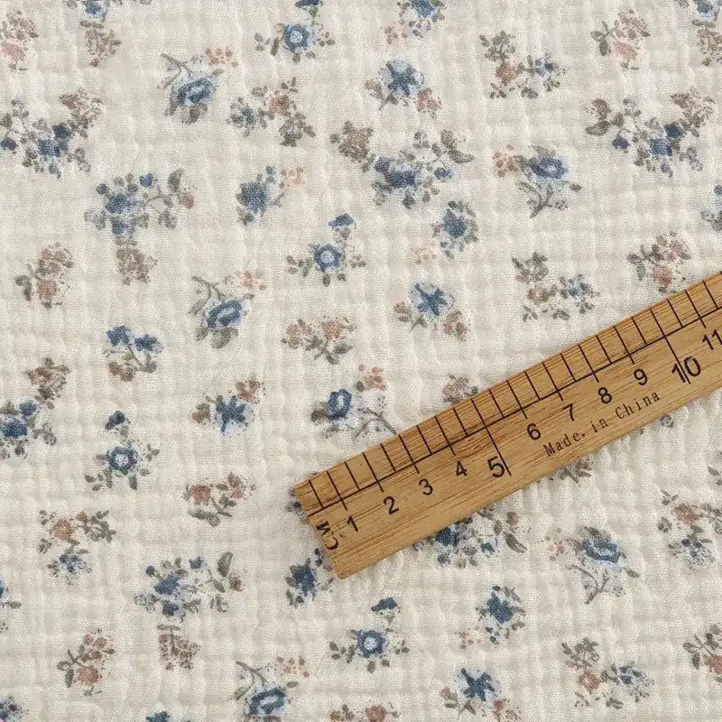 Tissu double gaze de coton à fleurs au mètre