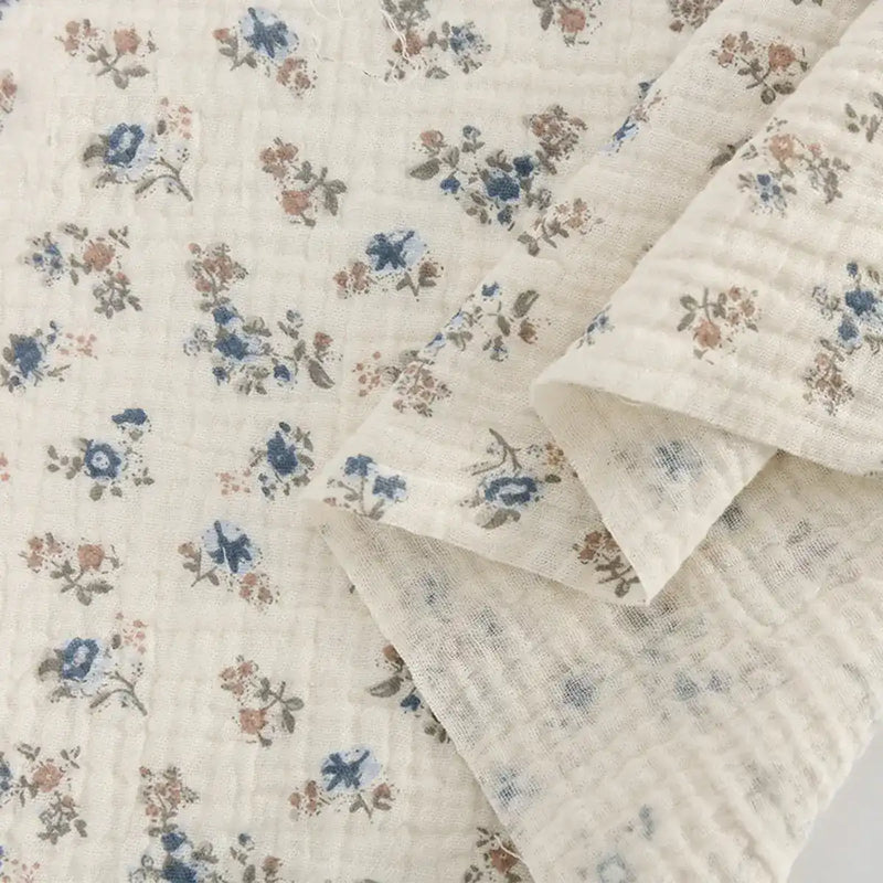 Tissu double gaze de coton à fleurs au mètre