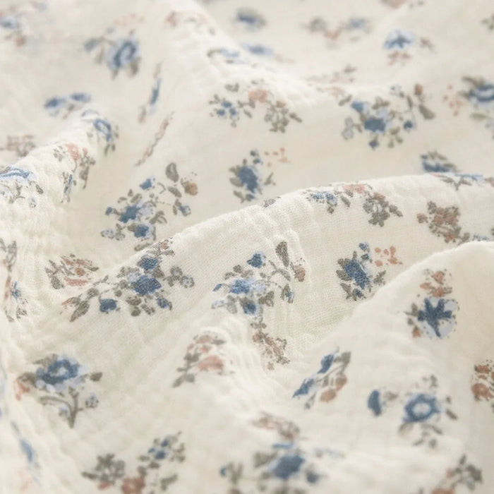 Tissu double gaze de coton à fleurs au mètre