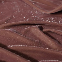 Gros plan sur Tissu velours pailleté au mètre de Longan Craft France-velours polyester doux argenté, brillant et scintillant, parfait pour décoration, robes de soirée et projets DIY couture.