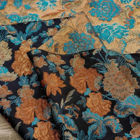 Tissu brocart brodé de fleurs rouges au mètre