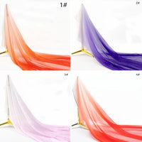 Quatre tissus semi-transparents Longan Craft France Mousseline transparente dégradée sont drapés sur un support, chacun dans un quadrant distinct : tons dégradés orange (1#), violet (2#), rose clair (3#) et rouge-orange (4#).