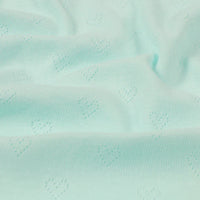 Découvrez le tissu pointelle jacquard en forme de cœur au mètre de Longan Craft France : un tissu tricoté fin d'été, doux et léger, idéal pour DIY et vêtements bébé ou enfants, orné de petits cœurs délicats.