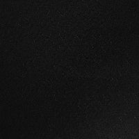 Gros plan sur le Tissu pointelle cœur au mètre de Longan Craft France, un tissu stretch noir, légèrement granuleux et mat. L'éclairage révèle sa texture subtile, ce qui le rend parfait pour les couches de base et les vêtements d'intérieur DIY.