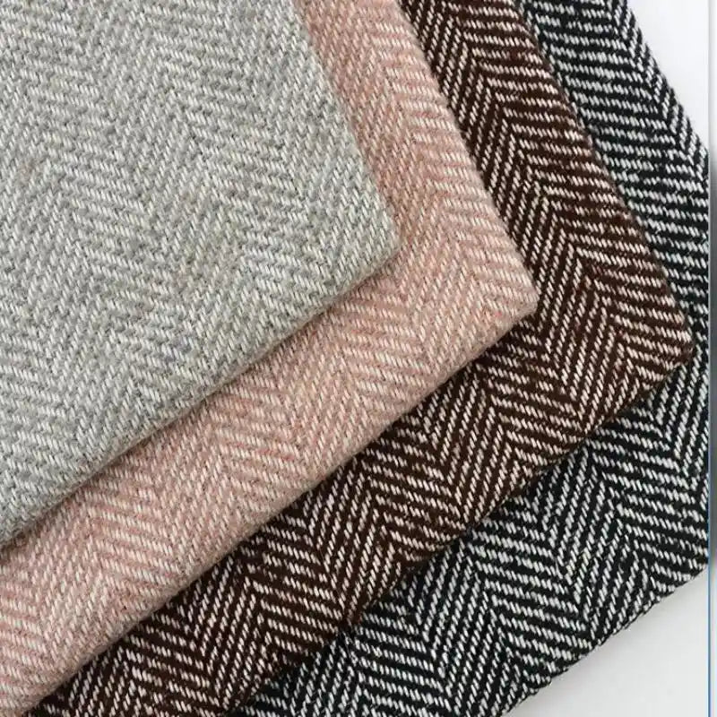 Tweed uni à chevrons au mètre