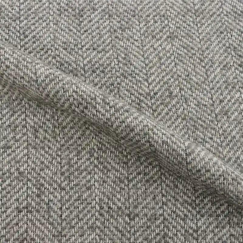Tweed uni à chevrons au mètre