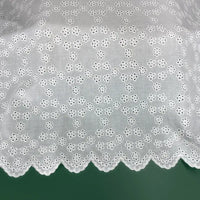 Tissu brodé ajouré blanc au mètre