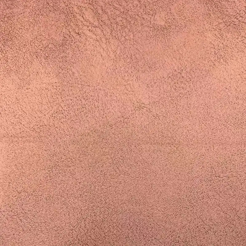 Gros plan sur le Tissu suédine imprimé au mètre de Longon Craft France, montrant sa texture marbrée brun clair, inspirée du litchi - un velours suédine parfait pour les manteaux, les canapés ou les projets de bricolage. Aucun motif distinct n'est visible.