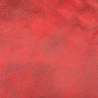 Gros plan sur le tissu suédine imprimé au mètre en rouge, à motif litchi pour manteau ou canapé de Longon Craft France, révélant de délicates variations de couleur et un aspect texturé velours, idéal pour le DIY.