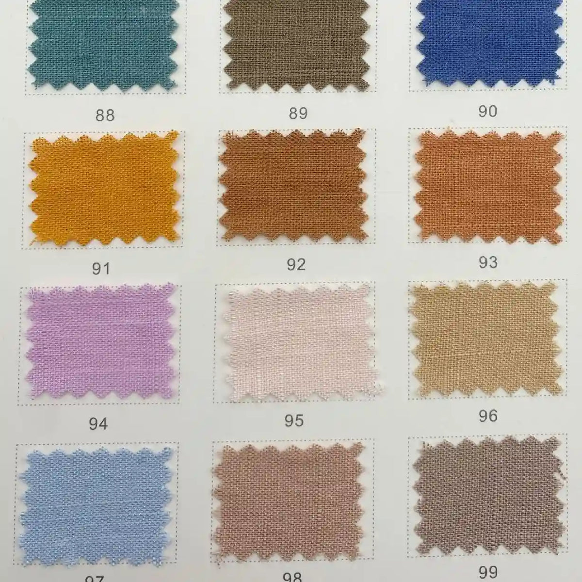 Un tableau présente douze échantillons du tissu lin viscose au mètre de Longan Craft France, étiqueté 88-99, en bleu, marron, orange, violet, rose et beige-idéal pour vêtements d'été grâce à sa matière viscose multicolore et légère.