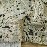 Tissu brocart métallisé noir et or au mètre