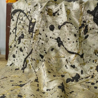 Tissu brocart métallisé noir et or au mètre