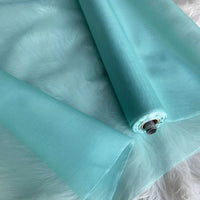 L'organza de soie multicolore 8 momme au mètre de Longan Craft France, fabriqué à partir de pure soie de mûrier, est un tissu de luxe semi-transparent et léger au lustre subtil, parfait pour les robes de soirée et les robes élégantes.