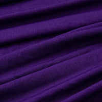 Un gros plan du Tissu jersey polyester multicolore au mètre de Longan Craft France montre des plis horizontaux visibles et une surface jersey polyester-élasthanne légèrement texturée, idéale pour la confection de robes.