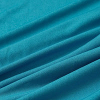 Gros plan sur le Tissu jersey polyester-élasthanne multicolore au mètre de Longan Craft France, montrant son tissage fin, sa surface lisse et extensible, et sa texture délicate - la matière idéale pour les peignoirs.