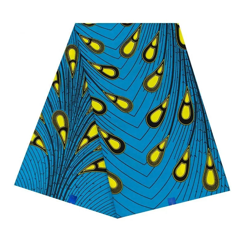 Tissu Ankara imprimé plume de paon au mètre de Longan Craft France : motif géométrique bleu, jaune et noir en coton wax africain 100 %, idéal pour créations DIY de hauts.