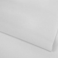 Gros plan sur l'éponge française uni au mètre de Longan Craft France, un tissu doux en polyester soigneusement plié pour mettre en valeur sa texture lisse, idéale pour confectionner des vêtements d'hiver chauds.