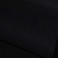 Un gros plan du tissu French terry uni au mètre de Longan Craft France montre son tissage en polyester texturé et sa surface douce, idéale pour les vêtements d'hiver.