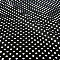 Le Tissu patchwork en coton imprimé pois au mètre de Longan Craft France présente des pois multicolores régulièrement espacés sur du coton, avec un pliage en diagonale - parfait comme textile confortable pour des projets de quilting ou de vêtements.