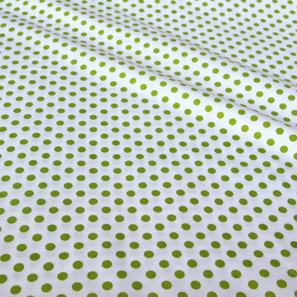 Tissu patchwork en coton imprimé pois multicolores au mètre de Longan Craft France, idéal pour quilting ou vêtements. Le tissu sergé montre des plis et ombres subtils, ajoutant texture et dimension à vos projets créatifs.