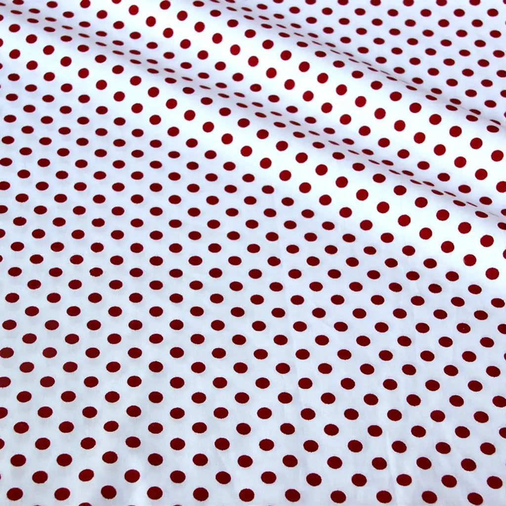 Tissu patchwork en coton imprimé pois multicolores Longan Craft France, vendu au mètre. Tissu sergé confortable idéal pour vêtements, quilting ou patchwork. Apparence : léger motif à pois, texture douce et facile à travailler.