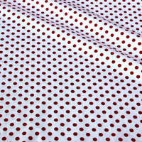 Tissu patchwork en coton imprimé pois multicolores Longan Craft France, vendu au mètre. Tissu sergé confortable idéal pour vêtements, quilting ou patchwork. Apparence : léger motif à pois, texture douce et facile à travailler.