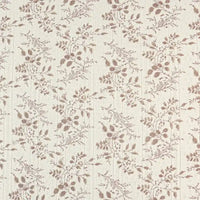 Tissu pointelle en coton imprimé au mètre de Longan Craft France : une maille délicate à motif floral beige et marron, idéale pour la couture DIY de vêtements d'enfants, apportant douceur et charme avec sa finition raffinée.