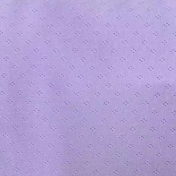 Tissu jersey pointelle 100% coton de Longan Craft France, léger et doux, avec motif jacquard discret de petits clusters réguliers. Idéal pour DIY body bébé. Vendu au mètre.