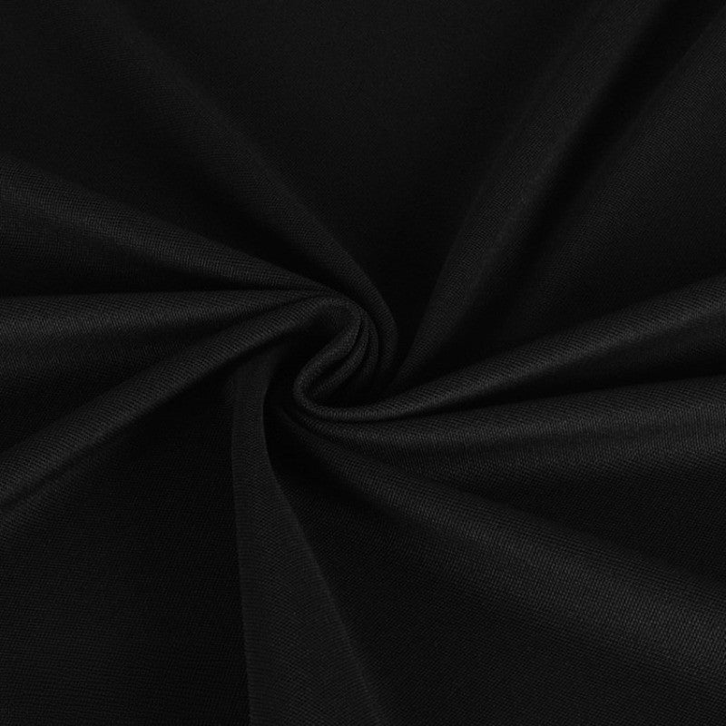 Un gros plan du tissu piqué uni simple face au mètre de Longan Craft France révèle la fine maille piqué d'été, torsadée pour montrer ses plis doux et sa texture respirante, idéale pour coudre des chemises à manches courtes.