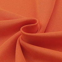 Gros plan sur le Tissu piqué motif œil d'oiseau à fil simple de Longan Craft France, montrant son tissage respirant, sa texture souple et ses plis doux - idéal pour les polos et les t-shirts d'été DIY.