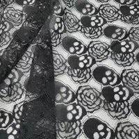 Tissu en dentelle tête de mort au mètre