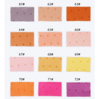 Un ensemble de 12 échantillons rectangulaires (61#-72#) du jacquard Tissu en satin à petits pois de Longan Craft France, présentant des points multicolores dans les tons violet clair, pêche, orange, jaune et rose, disposés trois par quatre.