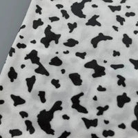 Minky motif vache doux au mètre