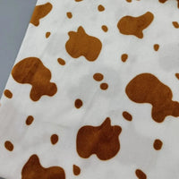 Minky motif vache doux au mètre