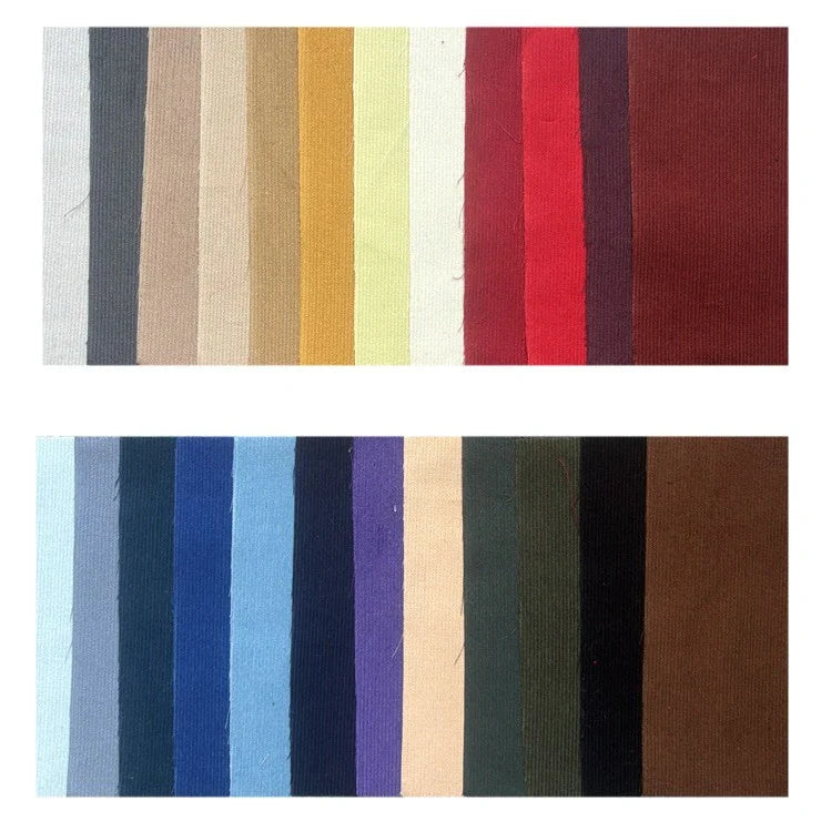 Des rangées d'échantillons de tissus de couleur unie présentent le Tissu velours côtelé uni 21 côtes au mètre de Longan Craft France - un velours de coton confortable pour la confection de vêtements - en beige, rouge, marron, bleu, vert, etc.