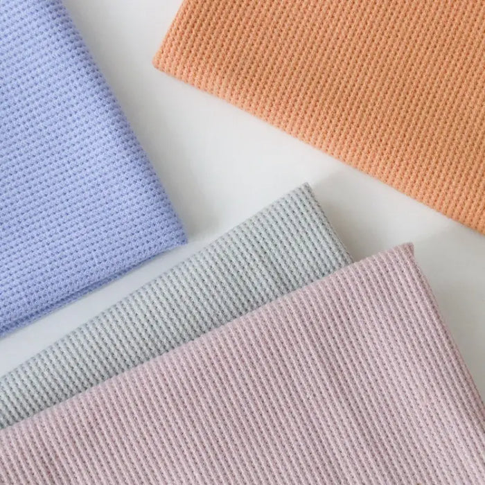 Tissu coton gaufré uni au mètre